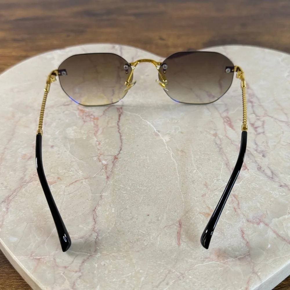 Gold and Blue Rimless Sunglasses
